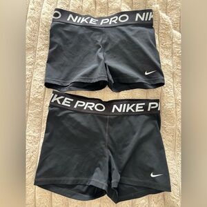 2 pairs of Women’s Nike Black Dri-FIT Pro Compression Shorts